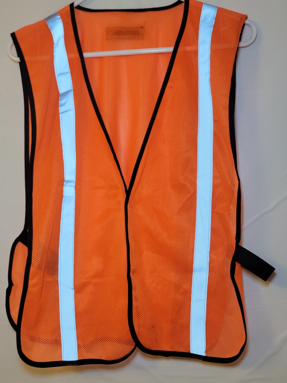 High-Visibility Orange Safety Vest with Reflective Stripes